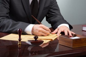 Lawyer at desk preparing case files